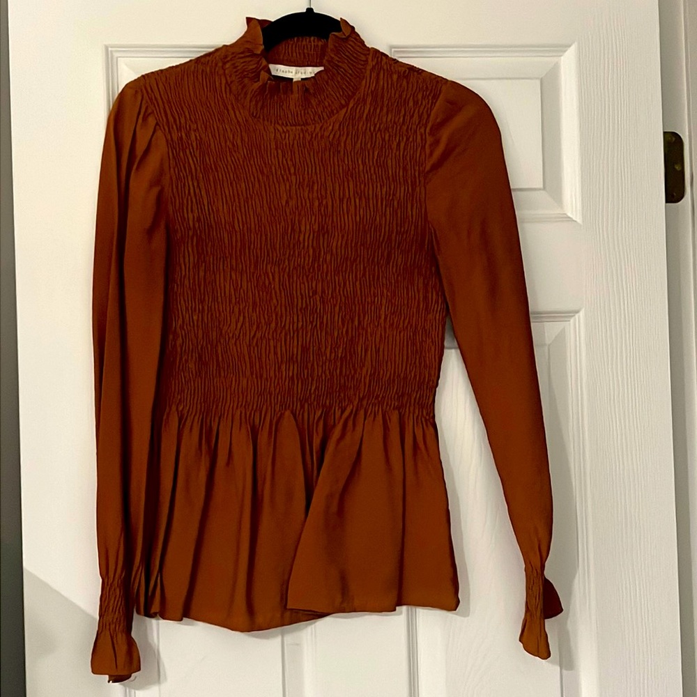 Long sleeve mock neck smocked peplum top